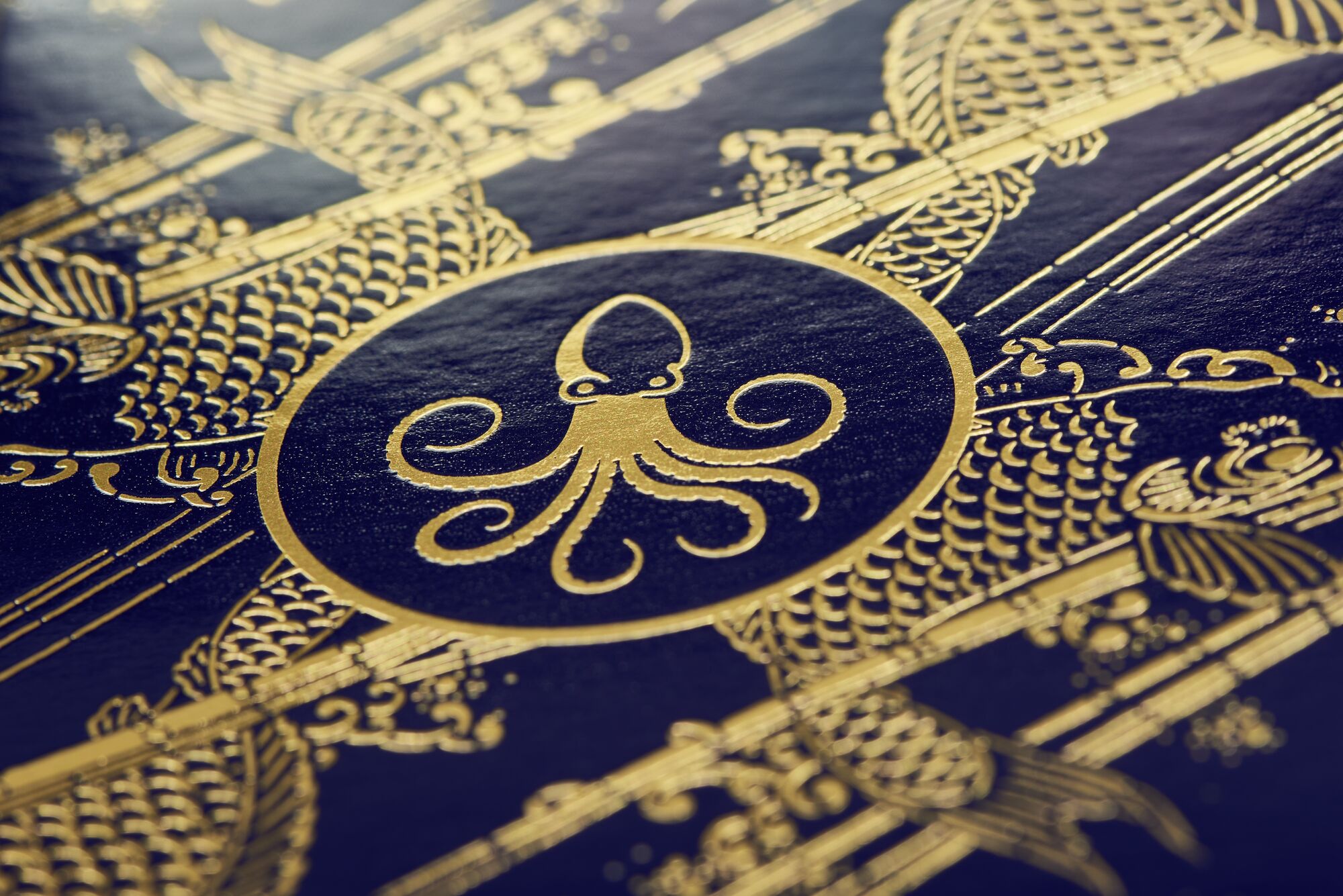 Gold hot stamping on UV-coated packaging surface with reduced gassing and air entrapment